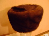 Продам новую женскую шапку 57-58 норка тёмно коричневаявая